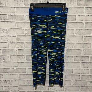 Women’s Nike Pro Capri length multicolored athletic leggings, Size Medium